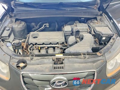 Zdjęcie 12 z 13 samochodu: 2010 HYUNDAI SANTA FE GLS VIN:5NMSGDAB8AH384574 - miniatura