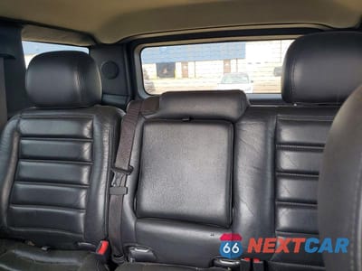 Zdjęcie 10 z 13 samochodu: 2006 HUMMER H2 VIN:5GRGN23UX6H122495 - miniatura