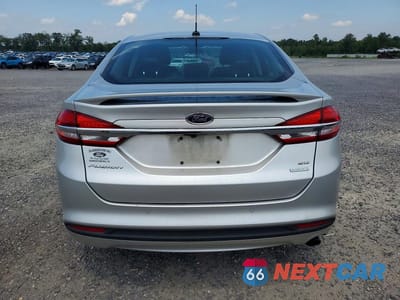 Zdjęcie 6 z 12 samochodu: 2018 FORD FUSION SE VIN:3FA6P0HD9JR229815 - miniatura