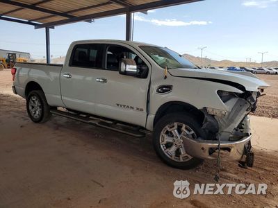 Czwarte zdjęcie samochodu z boku: 2016 NISSAN TITAN XD SL VIN:1N6BA1F29GN508188 - miniatura
