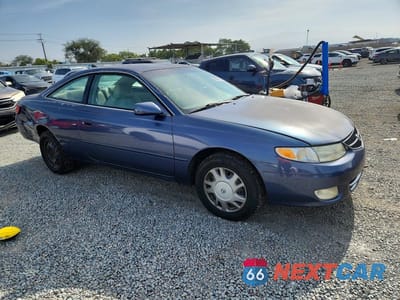 Czwarte zdjęcie samochodu z boku: 2000 TOYOTA CAMRY SOLARA SE VIN:2T1CG22P3YC276740 - miniatura