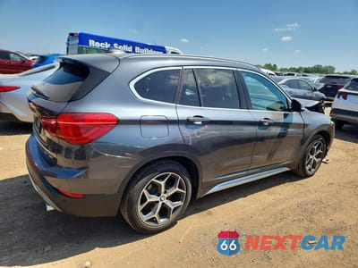Trzecie zdjęcie samochodu z tyłu: 2019 BMW X1 XDRIVE28I VIN:WBXHT3C54K5L35502 - miniatura