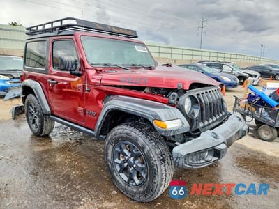 Czwarte zdjęcie samochodu z boku: 2021 JEEP WRANGLER SPORT VIN:1C4GJXAG1MW803788 - miniatura