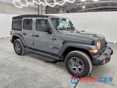 Czwarte zdjęcie samochodu z boku: 2023 JEEP WRANGLER SPORT VIN:1C4HJXDG5PW509413 - miniatura