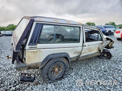 Trzecie zdjęcie samochodu z tyłu: 1990 JEEP CHEROKEE SPORT VIN:1J4FJ87LXLL124862 - miniatura