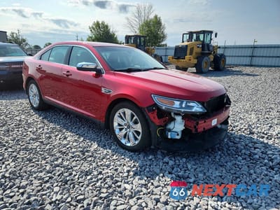 Czwarte zdjęcie samochodu z boku: 2011 FORD TAURUS LIMITED VIN:1FAHP2FW4BG110829 - miniatura
