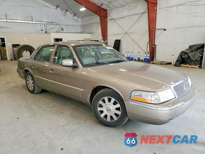 Czwarte zdjęcie samochodu z boku: 2004 MERCURY GRAND MARQUIS LS VIN:2MEFM75W04X617067 - miniatura