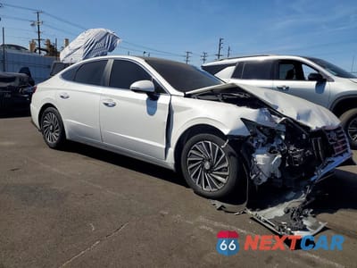 Czwarte zdjęcie samochodu z boku: 2022 HYUNDAI SONATA HYBRID LIMITED VIN:KMHL54JJ1NA038167 - miniatura