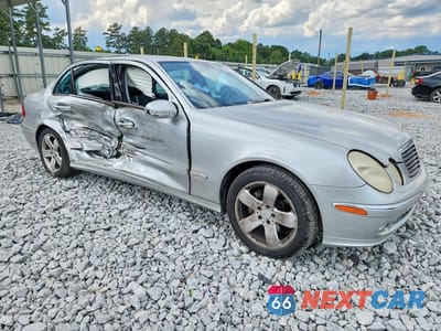 Czwarte zdjęcie samochodu z boku: 2003 MERCEDES-BENZ E 500 VIN:WDBUF70J63A295927 - miniatura