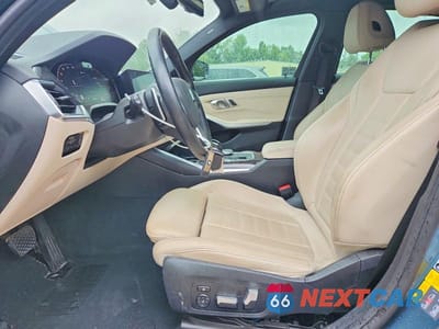 Zdjęcie 7 z 12 samochodu: 2021 BMW 330E VIN:3MW5P7J08M8B77283 - miniatura