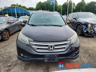 Piąte zdjęcie samochodu w środku: 2013 HONDA CR-V EXL VIN:2HKRM4H70DH670452 - miniatura