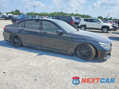 Czwarte zdjęcie samochodu z boku: 2018 BMW 750 XI VIN:WBA7F2C50JG424686 - miniatura