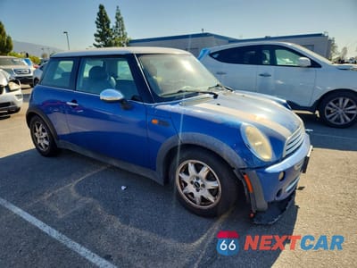 Czwarte zdjęcie samochodu z boku: 2006 MINI COOPER VIN:WMWRC33526TK17402 - miniatura