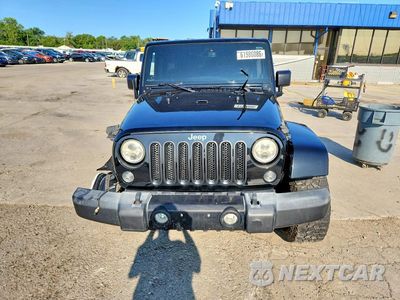 Piąte zdjęcie samochodu w środku: 2014 JEEP WRANGLER UNLIMITED SAHARA VIN:1C4BJWEG3EL287015 - miniatura