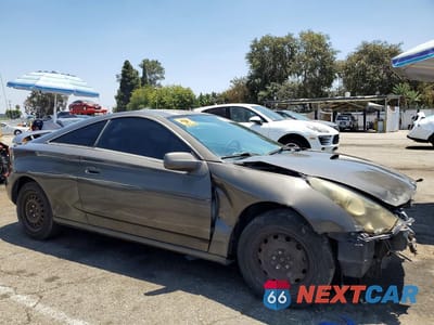 Czwarte zdjęcie samochodu z boku: 2004 TOYOTA CELICA GT VIN:JTDDR32T640168618 - miniatura