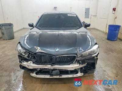 Piąte zdjęcie samochodu w środku: 2019 BMW 740 I VIN:WBA7E2C53KB217310 - miniatura