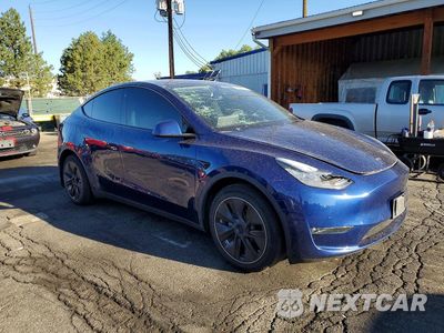 Czwarte zdjęcie samochodu z boku: 2021 TESLA MODEL Y VIN:5YJYGDEE7MF302192 - miniatura