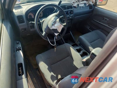 Zdjęcie 8 z 12 samochodu: 2004 NISSAN FRONTIER STANDARD VIN:1N6DD26T84C471575 - miniatura