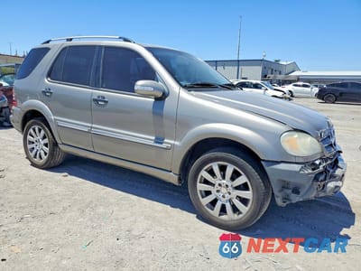Czwarte zdjęcie samochodu z boku: 2005 MERCEDES-BENZ ML 350 VIN:4JGAB57E95A542692 - miniatura
