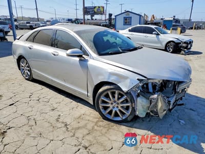 Czwarte zdjęcie samochodu z boku: 2015 LINCOLN MKZ HYBRID VIN:3LN6L2LU3FR612774 - miniatura