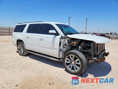 Czwarte zdjęcie samochodu z boku: 2016 CHEVROLET SUBURBAN C1500 LT VIN:1GNSCHKC3GR143530 - miniatura