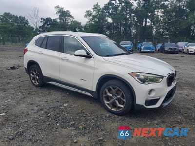 Czwarte zdjęcie samochodu z boku: 2016 BMW X1 XDRIVE28I VIN:WBXHT3Z32G4A48942 - miniatura