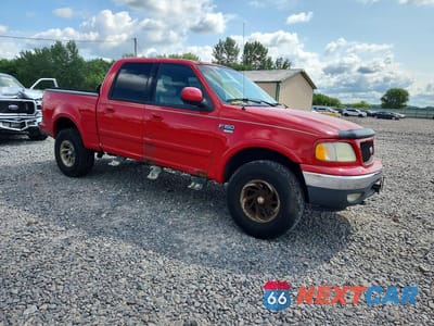 Czwarte zdjęcie samochodu z boku: 2001 FORD F150 SUPERCREW VIN:1FTRW08L91KC32624 - miniatura
