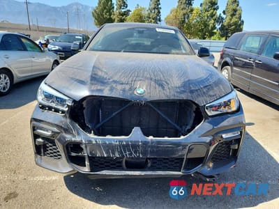 Piąte zdjęcie samochodu w środku: 2020 BMW X6 M50I VIN:5UXCY8C02L9D51073 - miniatura