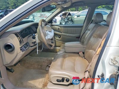 Zdjęcie 7 z 13 samochodu: 2000 BUICK PARK AVENUE ULTRA VIN:1G4CU5217Y4156508 - miniatura