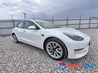 Czwarte zdjęcie samochodu z boku: 2023 TESLA MODEL 3 VIN:5YJ3E1EA9PF457777 - miniatura