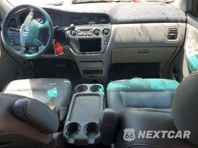 Zdjęcie 8 z 13 samochodu: 2004 HONDA ODYSSEY EXL VIN:2HKRL18072H541271 - miniatura