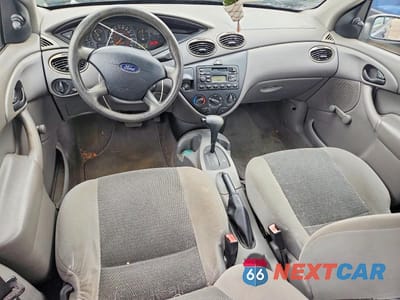 Zdjęcie 8 z 12 samochodu: 2003 FORD FOCUS LX VIN:1FAFP33PX3W267816 - miniatura