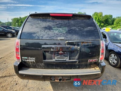 Zdjęcie 6 z 13 samochodu: 2012 GMC YUKON DENALI VIN:1GKS2EEF7CR297236 - miniatura