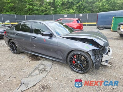 Czwarte zdjęcie samochodu z boku: 2022 BMW M340XI VIN:3MW5U9J05N8C61664 - miniatura
