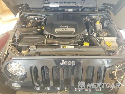 Zdjęcie 12 z 13 samochodu: 2015 JEEP WRANGLER UNLIMITED SAHARA VIN:1C4BJWEG6FL690620 - miniatura