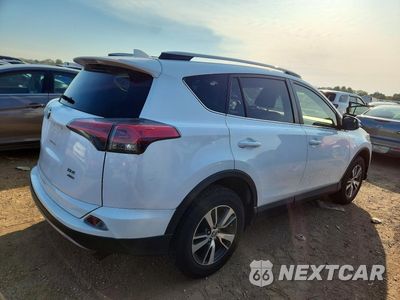 Trzecie zdjęcie samochodu z tyłu: 2018 TOYOTA RAV4 XLE VIN:JTMRFREV2JJ240581 - miniatura