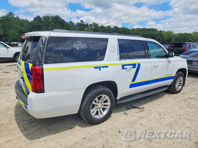 Trzecie zdjęcie samochodu z tyłu: 2019 CHEVROLET SUBURBAN K1500 4WD EQUIPPED VIN:1GNSKKEC2KR146357 - miniatura