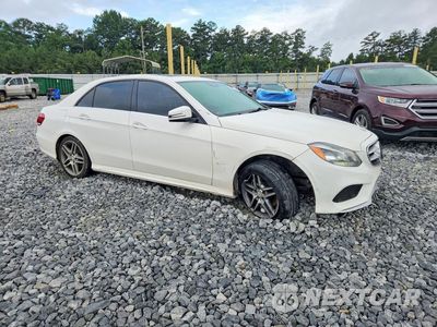Czwarte zdjęcie samochodu z boku: 2014 MERCEDES-BENZ E 350 VIN:WDDHF5KB4EA834633 - miniatura