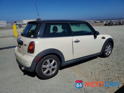 Trzecie zdjęcie samochodu z tyłu: 2009 MINI COOPER VIN:WMWMF335X9TU75740 - miniatura