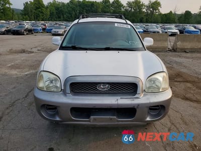 Piąte zdjęcie samochodu w środku: 2004 HYUNDAI SANTA FE BASE VIN:KM8SB12B74U819136 - miniatura