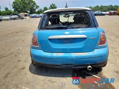 Zdjęcie 6 z 13 samochodu: 2010 MINI COOPER VIN:WMWMF3C51ATZ22704 - miniatura