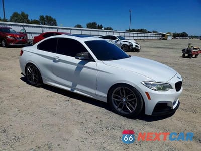 Czwarte zdjęcie samochodu z boku: 2017 BMW M240I VIN:WBA2G1C37HV639553 - miniatura