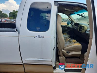 Zdjęcie 10 z 12 samochodu: 2000 FORD F150 VIN:1FTRX17L9YNA85959 - miniatura