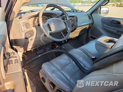 Zdjęcie 8 z 12 samochodu: 2001 FORD F-150 VIN:1FTRX18L11NB08865 - miniatura