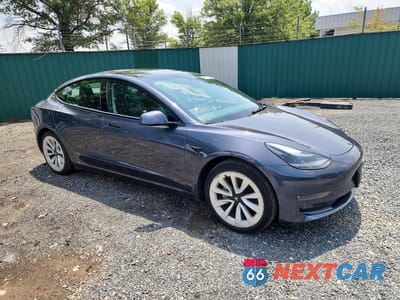Czwarte zdjęcie samochodu z boku: 2022 TESLA MODEL 3 VIN:5YJ3E1EB2NF291348 - miniatura