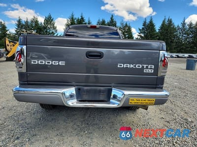 Zdjęcie 6 z 12 samochodu: 2004 DODGE DAKOTA QUAD SLT VIN:1D7HG48N64S718366 - miniatura