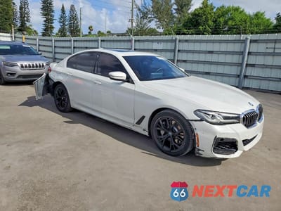 Czwarte zdjęcie samochodu z boku: 2021 BMW 530E VIN:WBA13AG04MCH28187 - miniatura