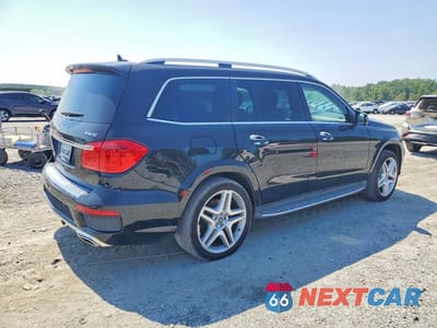 Trzecie zdjęcie samochodu z tyłu: 2014 MERCEDES-BENZ GL 550 4MATIC VIN:4JGDF7DE8EA400822 - miniatura