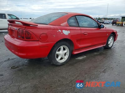Trzecie zdjęcie samochodu z tyłu: 1998 FORD MUSTANG VIN:1FAFP4044WF194141 - miniatura