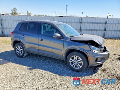 Czwarte zdjęcie samochodu z boku: 2014 VOLKSWAGEN TIGUAN S VIN:WVGBV3AX5EW621354 - miniatura